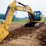 CAT 323 GC Excavator digging clay with a general duty bucket