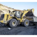 CAT 972L Wheel Loader loading a haul truck at a quarry