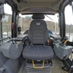 CAT 980 cab — suspension seat with seat-mounted joystick controls