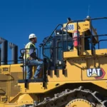 CAT D11 Bulldozer cab access platform with handrails and fire extinguishers