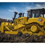 CAT D6 Bulldozer with SU blade pushing soil on a job site