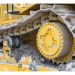 CAT D8 Bulldozer elevated sprocket and track links, close-up