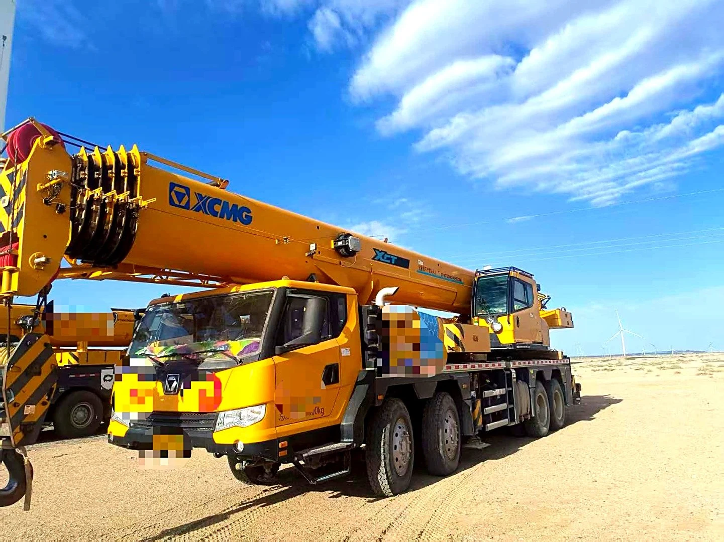 Camión grúa usado XCMG XCT55L6, vista frontal de tres cuartos